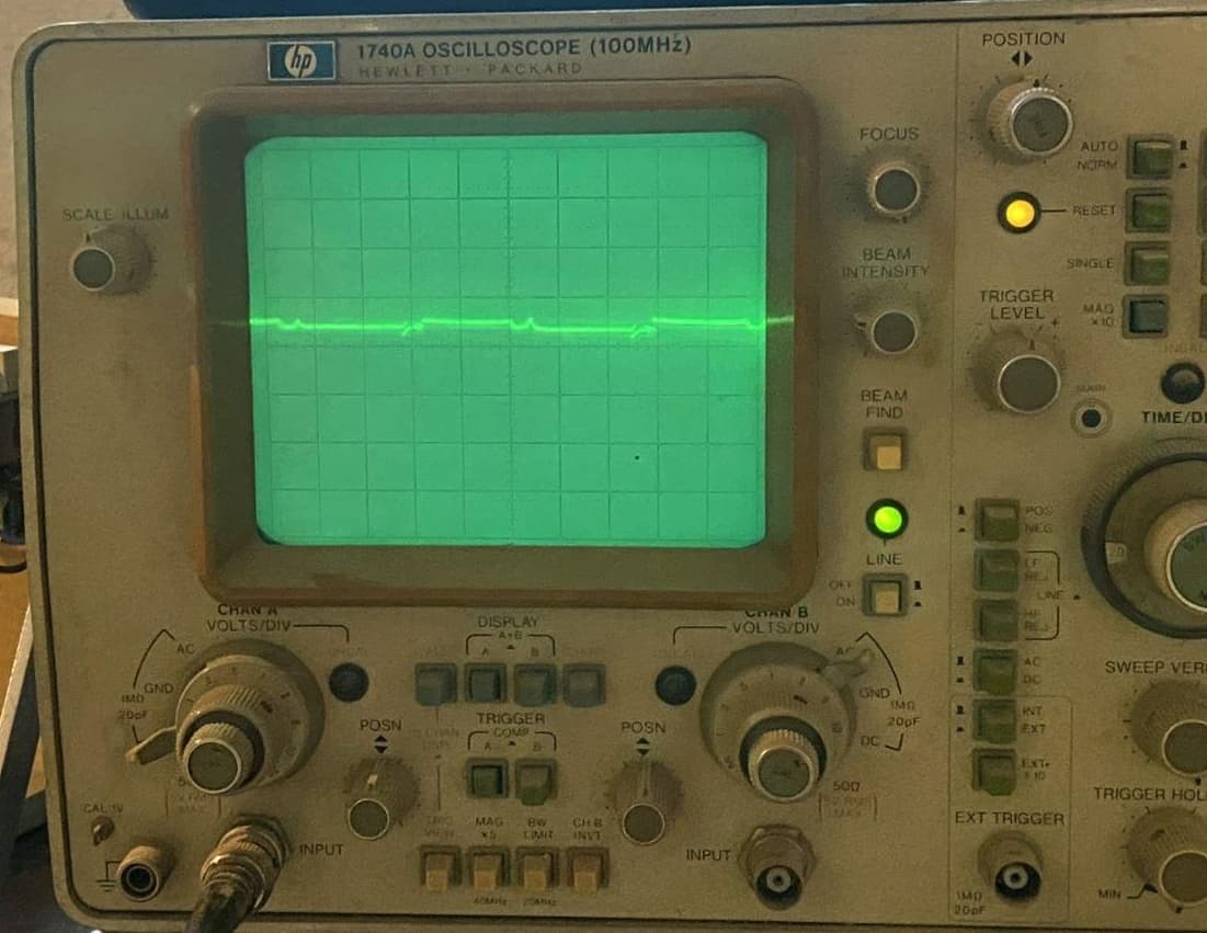 1740A HP oscilloscope with a line that has only a few small and irregular looking spikes
